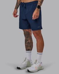 Man wearing Rep 7'' Performance Short in Future Navy | Size:S