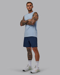 Man wearing Rep 7'' Performance Short in Future Navy | Size:S