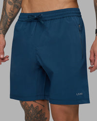 Man wearing Rep 7'' Performance Short - Night Sea | Model:Tommy | Size:S
