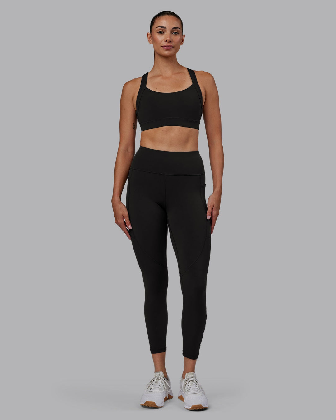 Woman wearing Rep 7/8 Length Leggings - Pirate Black-White