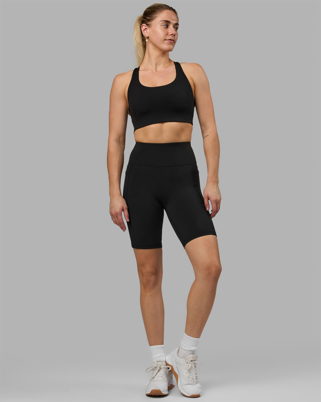 Woman wearing Rep Bike Shorts - Black-Black