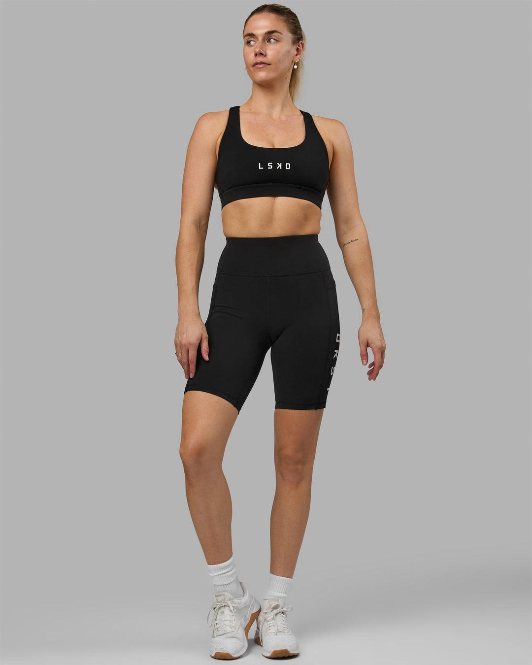 Woman wearing Rep Bike Shorts - Black-White