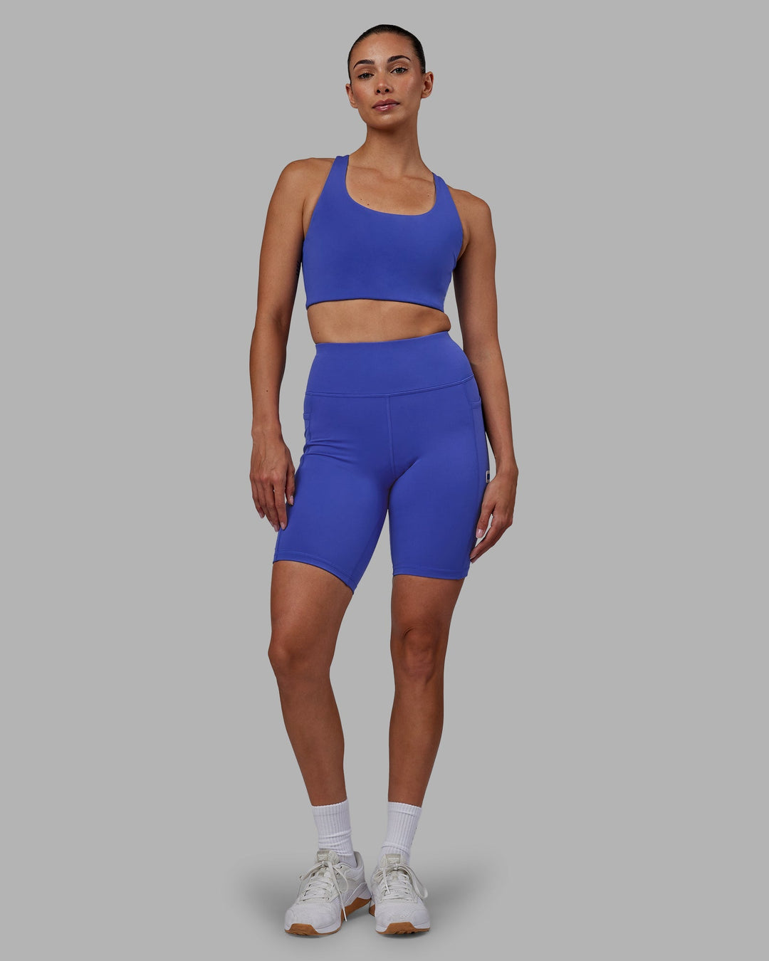 Woman wearing Rep Bike Shorts - Power Cobalt-White