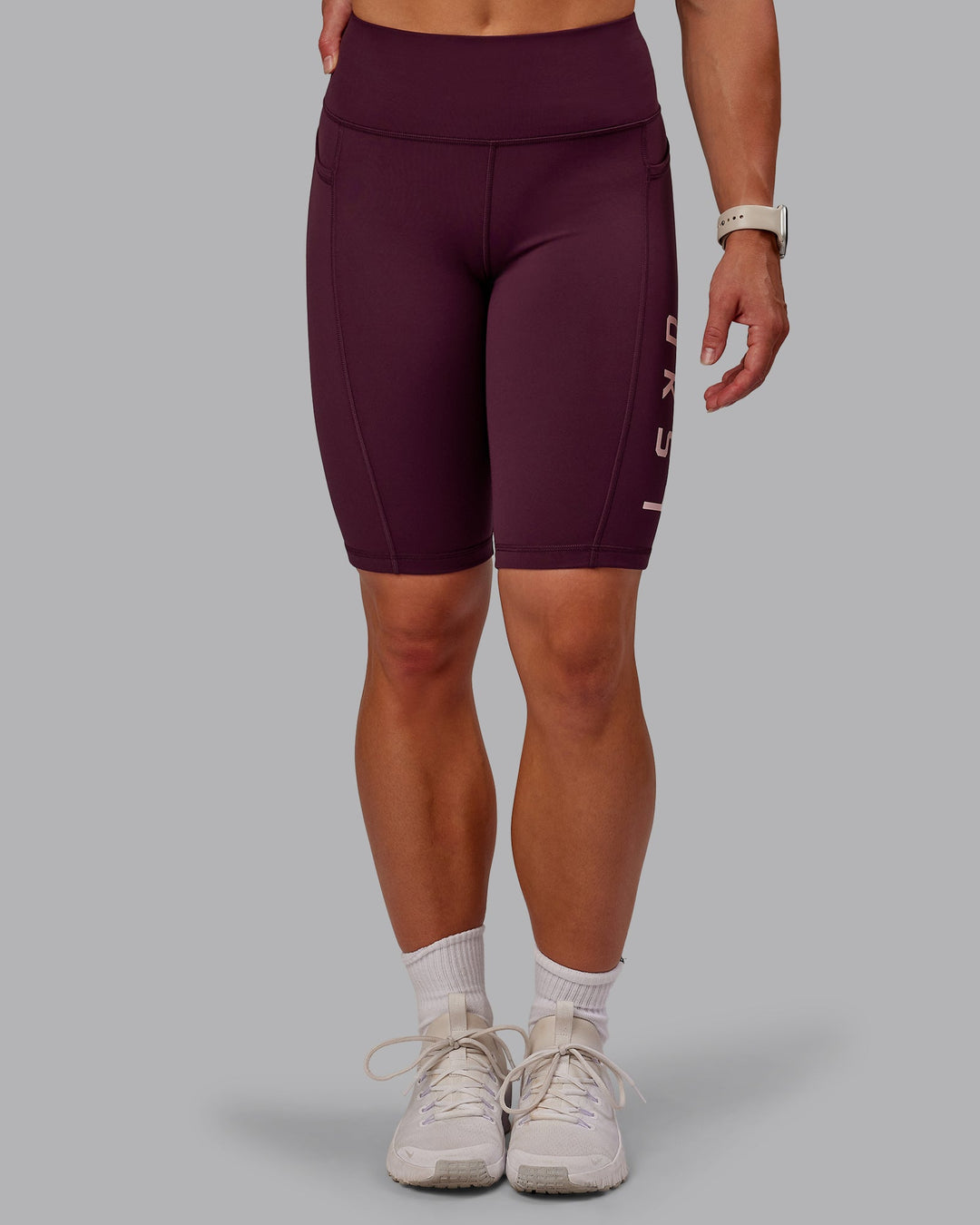 Woman wearing Rep Bike Shorts - Cherry Lacquer-Marshmallow