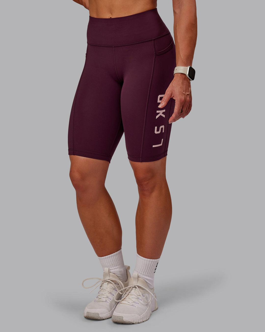 Woman wearing Rep Bike Shorts - Cherry Lacquer-Marshmallow