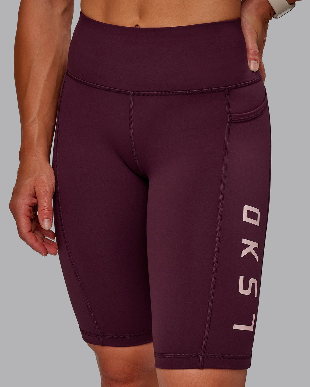 Woman wearing Rep Bike Shorts - Cherry Lacquer-Marshmallow