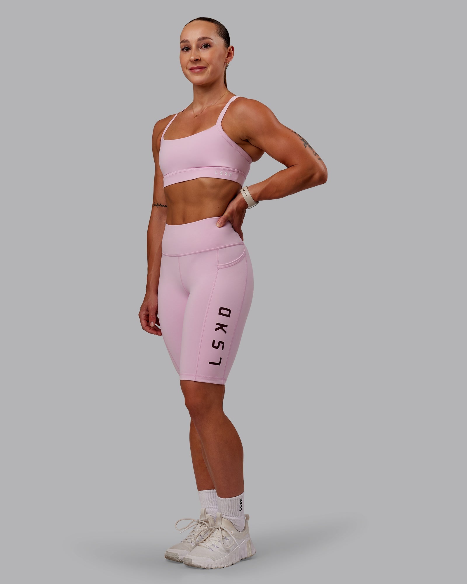 Woman wearing Rep Ultra High-Rise 9" Short Pockets - Marshmallow-Cherry Lacquer