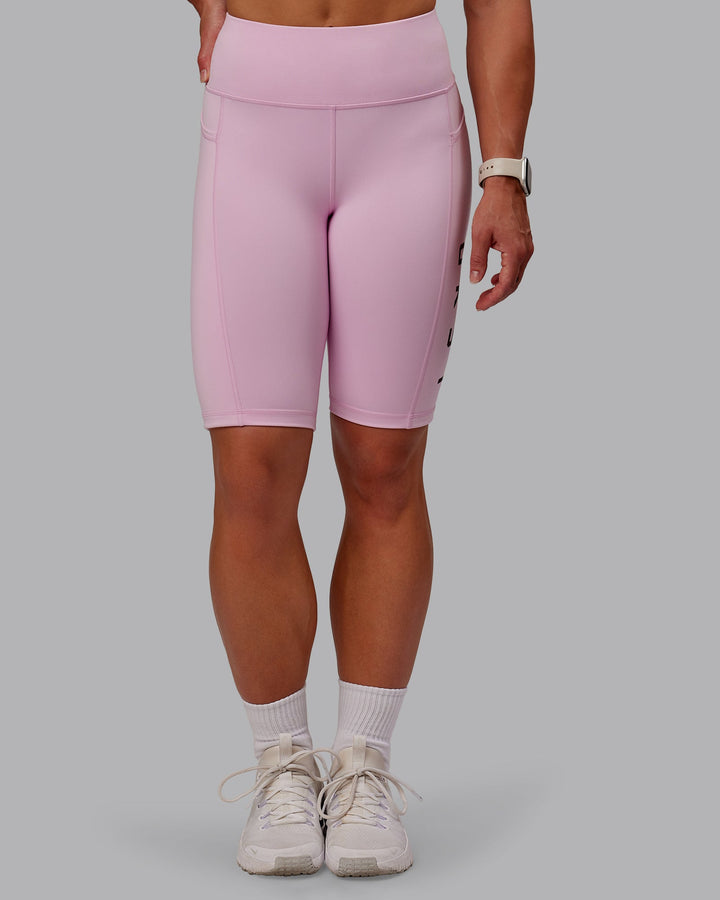 Woman wearing Rep Bike Shorts - Marshmallow-Cherry Lacquer
