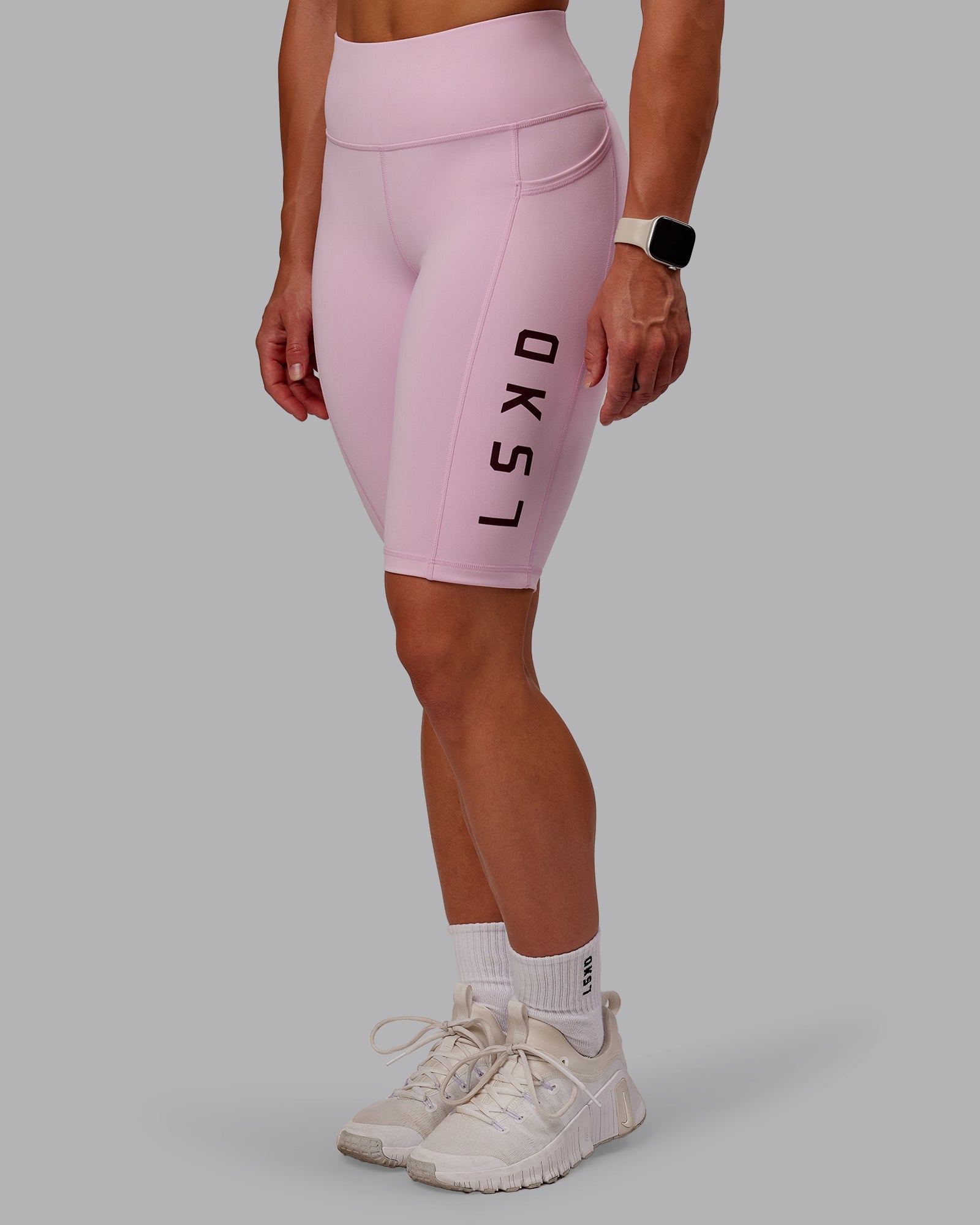 Woman wearing Rep Ultra High-Rise 9" Short Pockets - Marshmallow-Cherry Lacquer