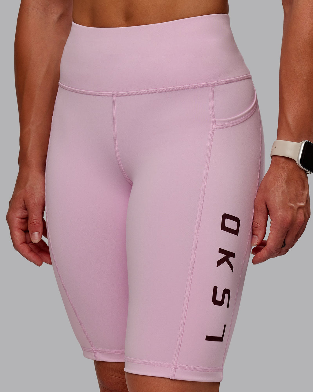 Woman wearing Rep Bike Shorts - Marshmallow-Cherry Lacquer