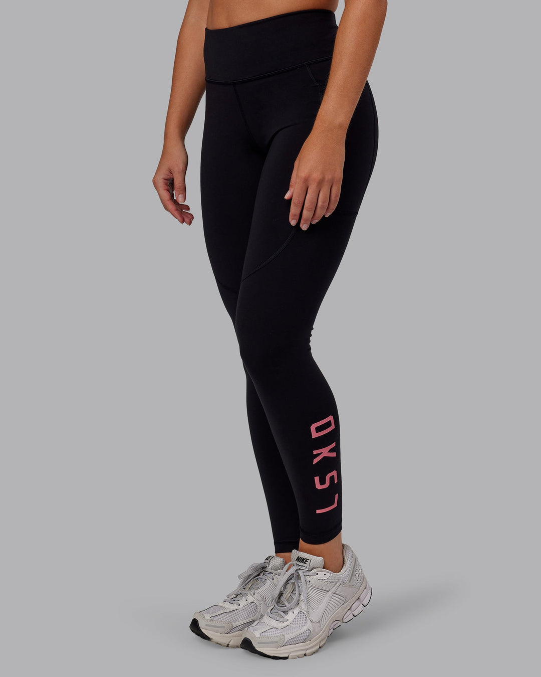 Woman wearing Rep Full Length Tight - Black-Pink Lemonade | Model:Hannah | Size:S