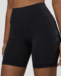 Woman wearing Rep Ultra High-Rise 6" Short Pockets - Black-Black | Model:Jordan | Size:S