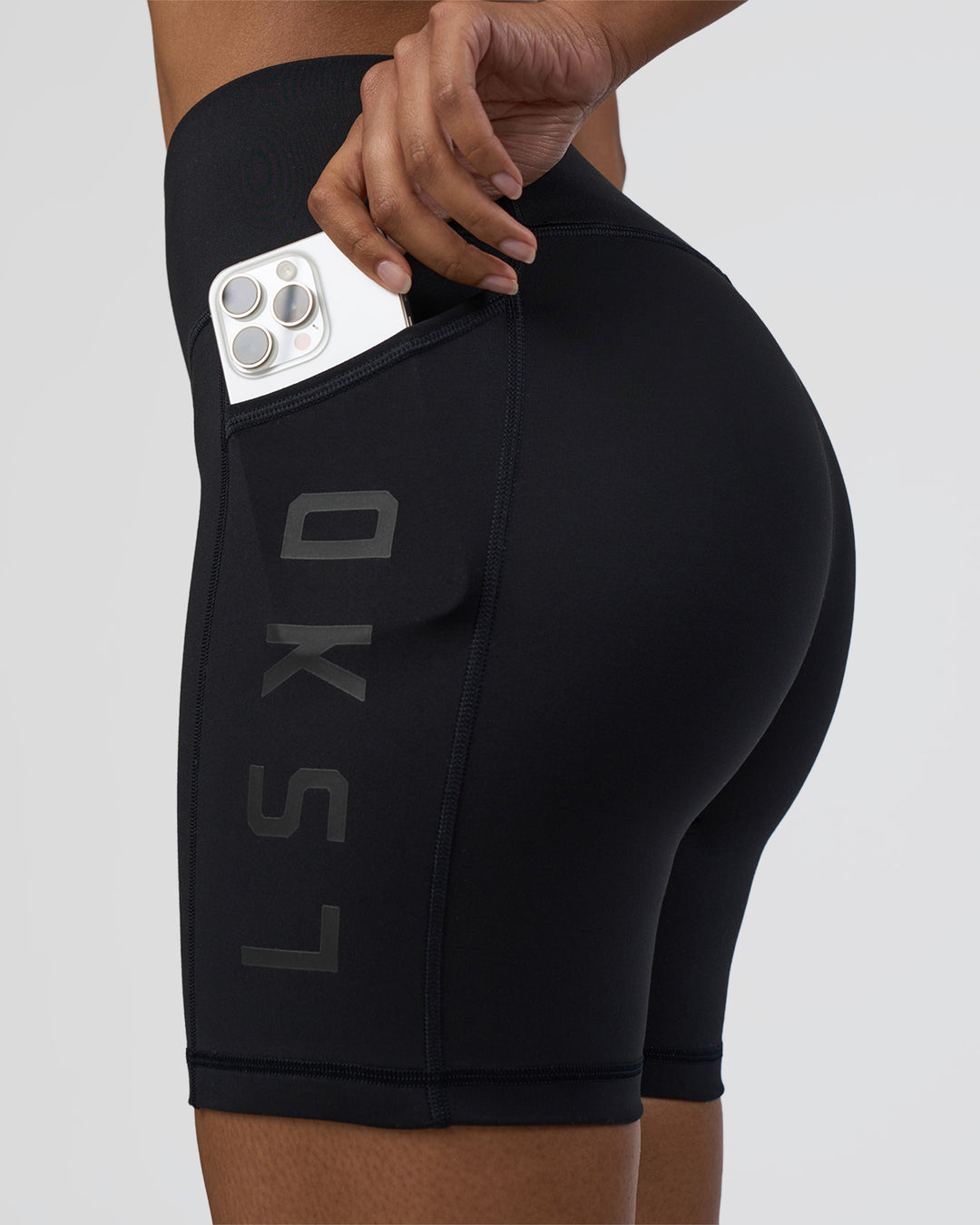 Woman wearing Rep Ultra High-Rise 6&quot; Short Pockets - Black-Black | Model:Jordan | Size:S