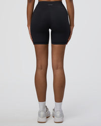 Woman wearing Rep Ultra High-Rise 6" Short Pockets - Black-Black | Model:Jordan | Size:S