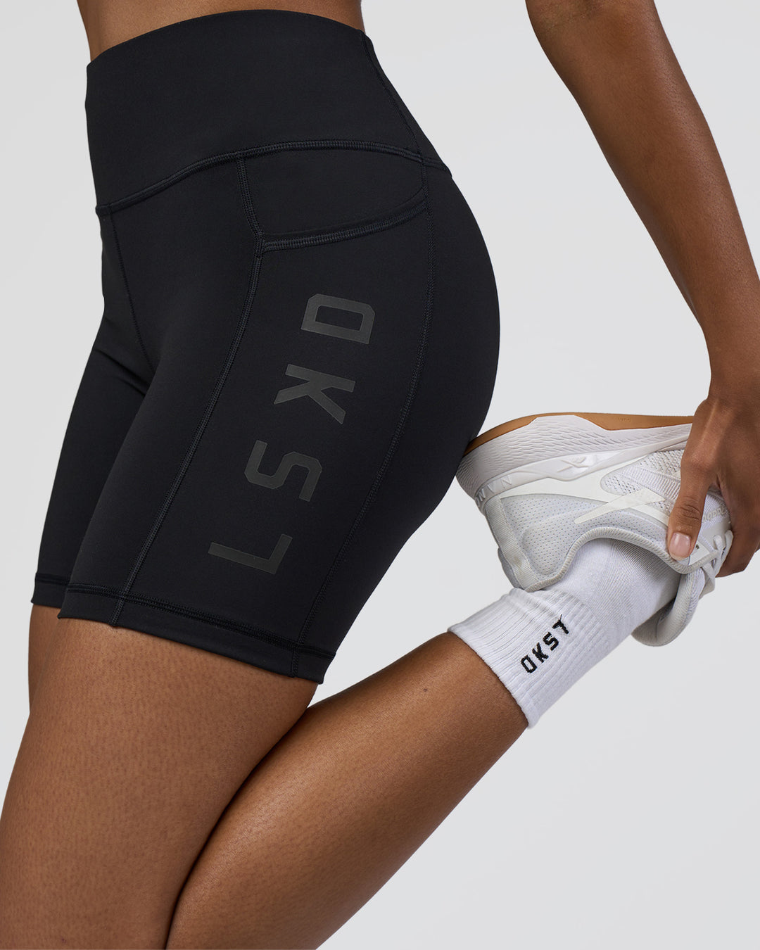 Woman wearing Rep Ultra High-Rise 6&quot; Short Pockets - Black-Black | Model:Jordan | Size:S