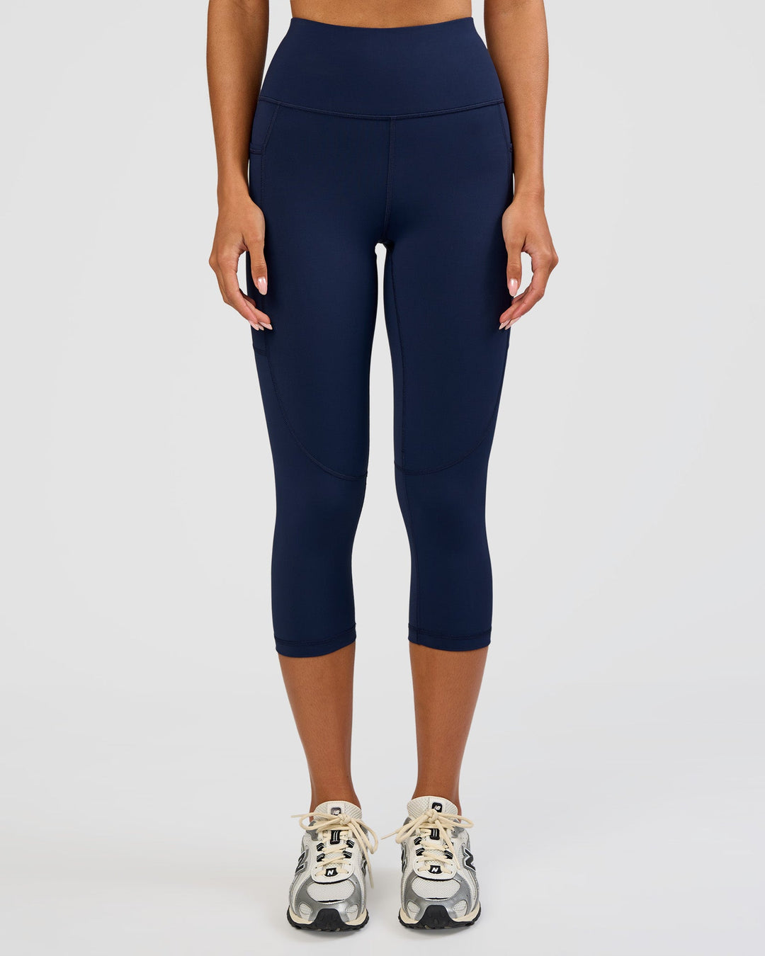 Woman wearing Rep Ultra High-Rise 3/4 Legging Pockets - Future Navy-White | Model:Dakota | Size:S