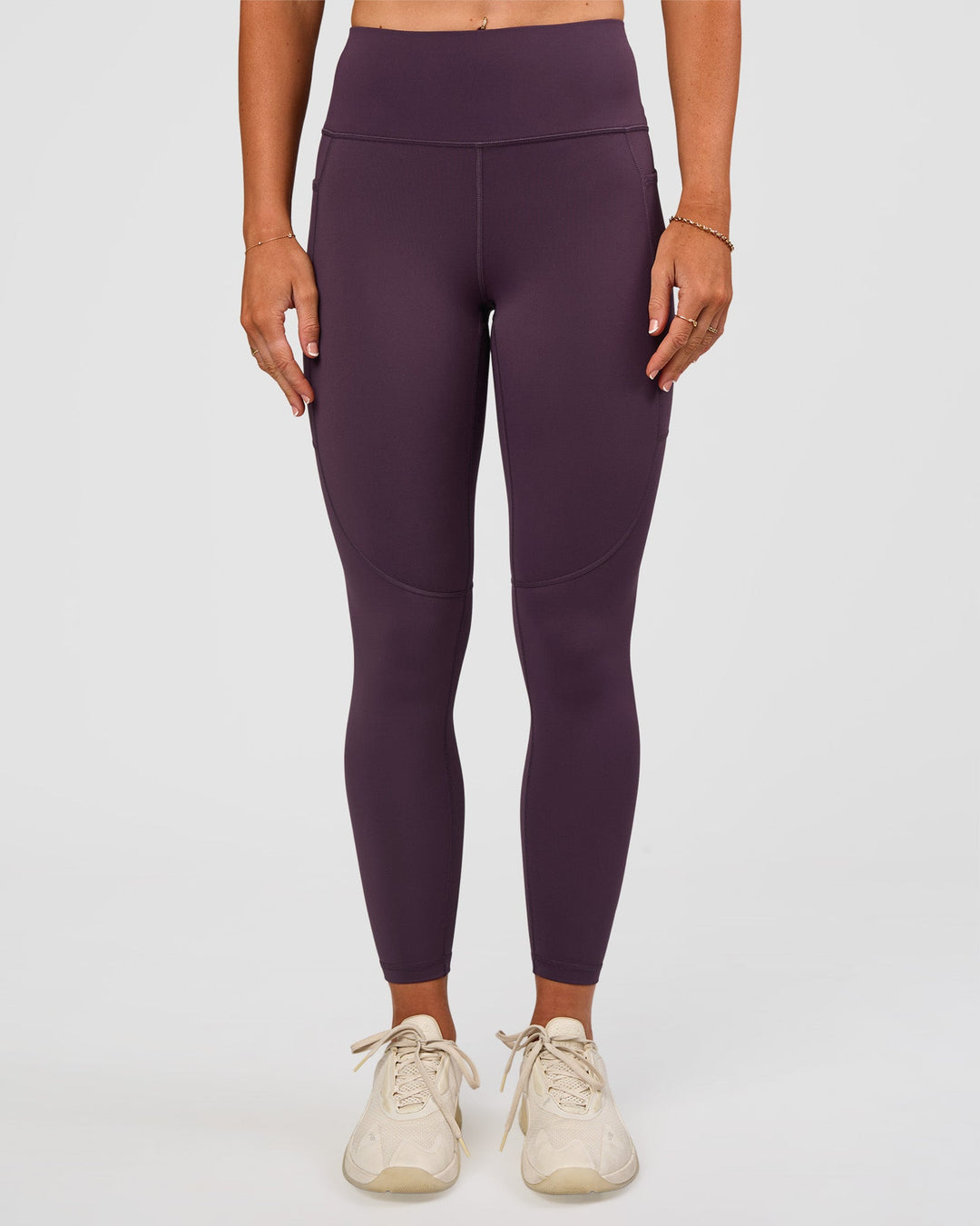 Woman wearing Rep Ultra High-Rise 7/8 Legging Pockets - Midnight Plum-Marshmallow | Model:Emelia | Size:S - view 7