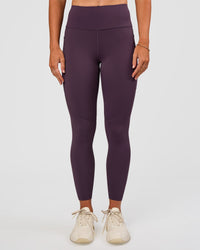 Woman wearing Rep Ultra High-Rise 7/8 Legging Pockets - Midnight Plum-Marshmallow | Model:Emelia | Size:S | Thumbnail Index: 6