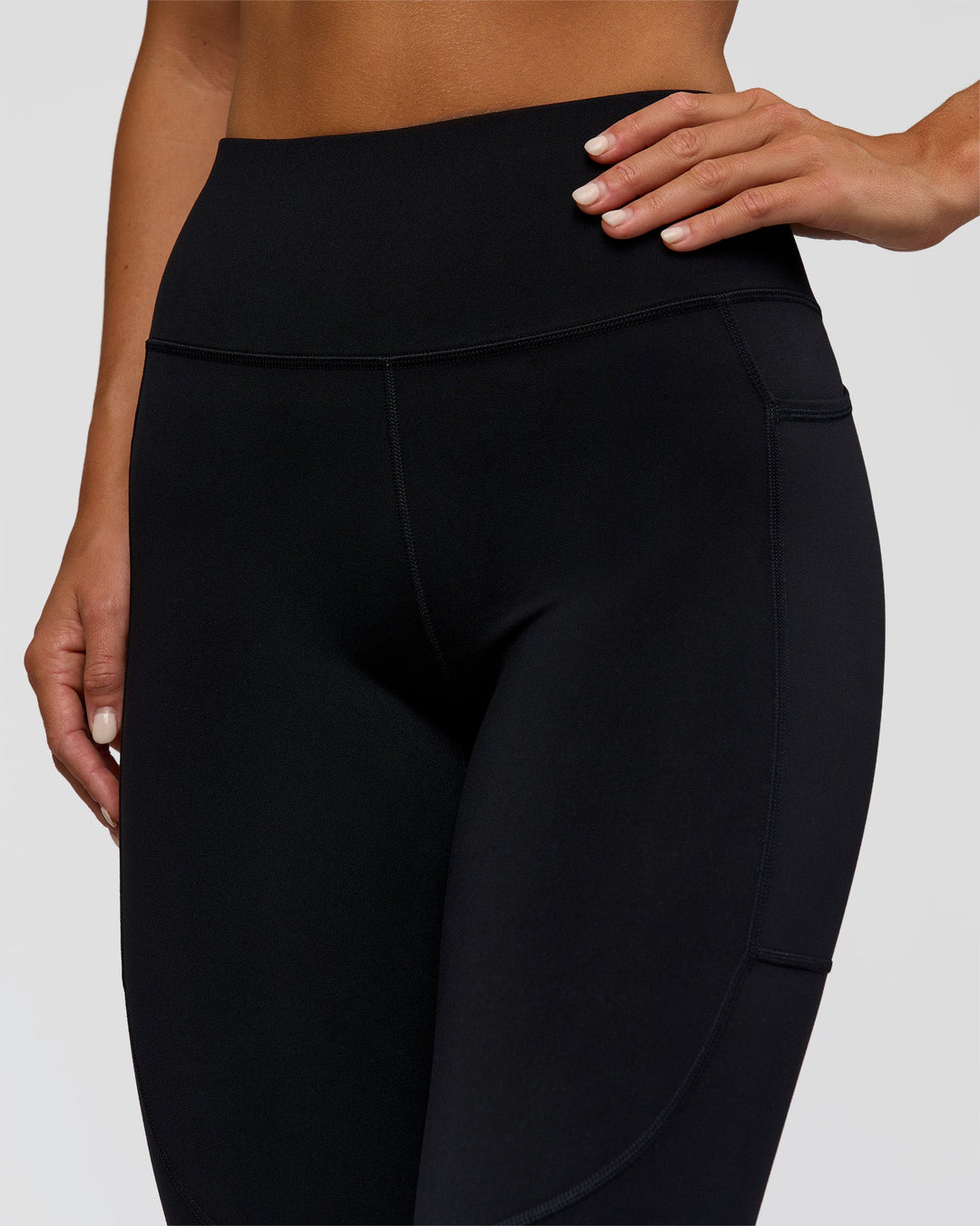 Woman wearing Rep Ultra High-Rise Full Length Legging Pockets - Black-Palace Blue | Model:Amity | Size:S