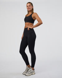 Woman wearing Rep Ultra High-Rise Full Length Legging Pockets - Black-Black | Model:Amity | Size:S