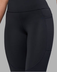 Woman wearing Rep Ultra High-Rise Full Length Legging Pockets - Black-Blue Atoll | Model:Sophie | Size:S | Thumbnail Index: 7