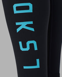 Woman wearing Rep Ultra High-Rise Full Length Legging Pockets - Black-Blue Atoll | Model:Sophie | Size:S | Thumbnail Index: 5