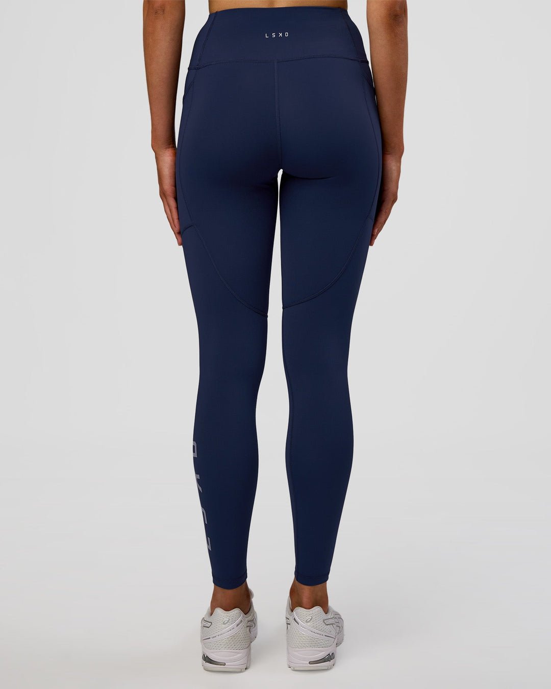 Woman wearing Rep Ultra High-Rise Full Length Legging Pockets - Future Navy-White | Model:Evie | Size:S