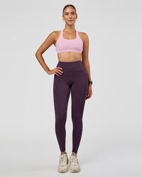 Woman wearing Rep Ultra High-Rise Full Length Legging Pockets - Midnight Plum-Marshmallow | Model:Rhiley | Size:S