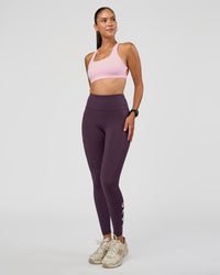Woman wearing Rep Ultra High-Rise Full Length Legging Pockets - Midnight Plum-Marshmallow | Model:Rhiley | Size:S