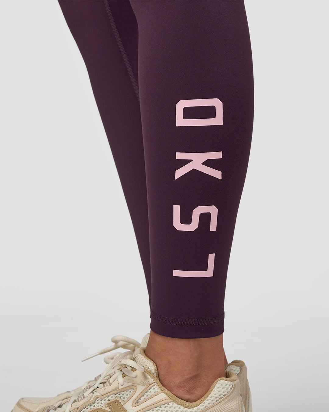 Woman wearing Rep Ultra High-Rise Full Length Legging Pockets - Midnight Plum-Marshmallow | Model:Rhiley | Size:S