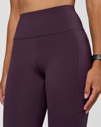 Woman wearing Rep Ultra High-Rise Full Length Legging Pockets - Midnight Plum-Marshmallow | Model:Rhiley | Size:S