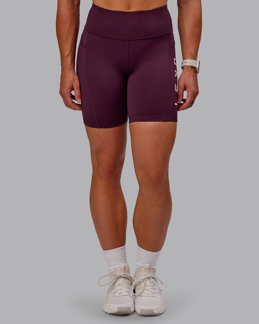 Woman wearing Rep Mid Short Tights - Cherry Lacquer-Marshmallow