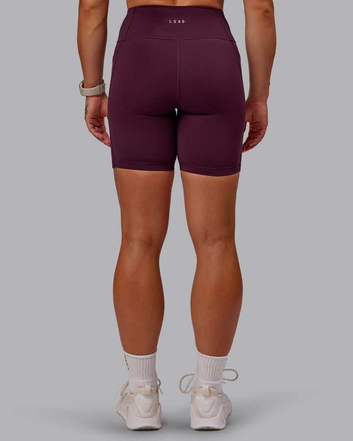 Woman wearing Rep Mid Short Tights - Cherry Lacquer-Marshmallow
