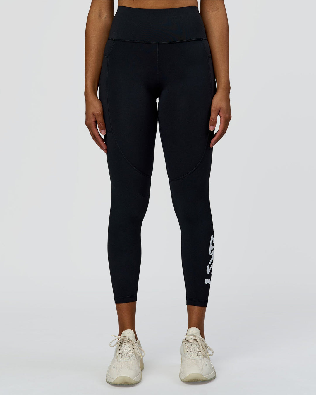 Woman wearing Rep Street Script Ultra High-Rise 7/8 Legging Pockets - Black-White | Model:Rosie | Size:S