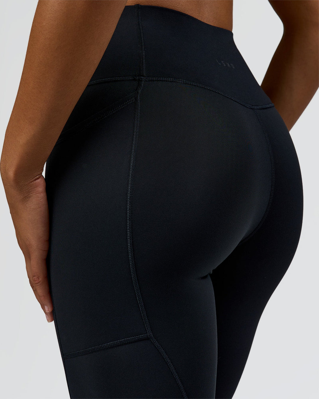 Woman wearing Rep Street Script Ultra High-Rise 7/8 Legging Pockets - Black-White | Model:Rosie | Size:S