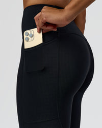 Woman wearing Rep Street Script Ultra High-Rise Full Length Legging Pockets - Black-White | Model:Rosie | Size:S
