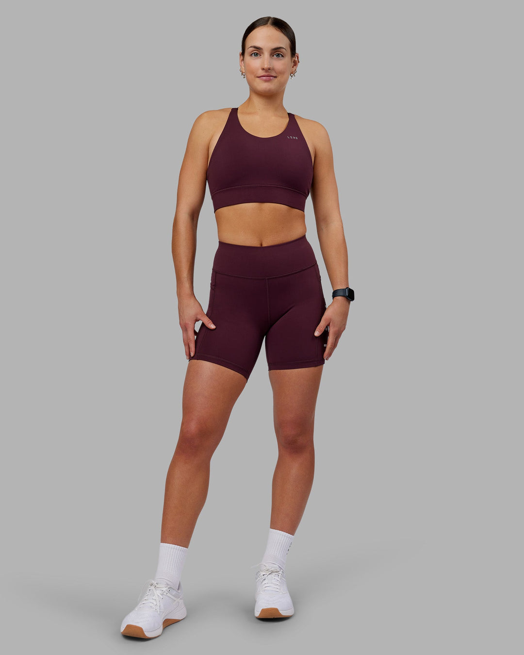 Woman wearing Rep Ultra High-Rise 6&quot; Short Pockets - Cherry Lacquer-White | Model:Keisha | Size:S