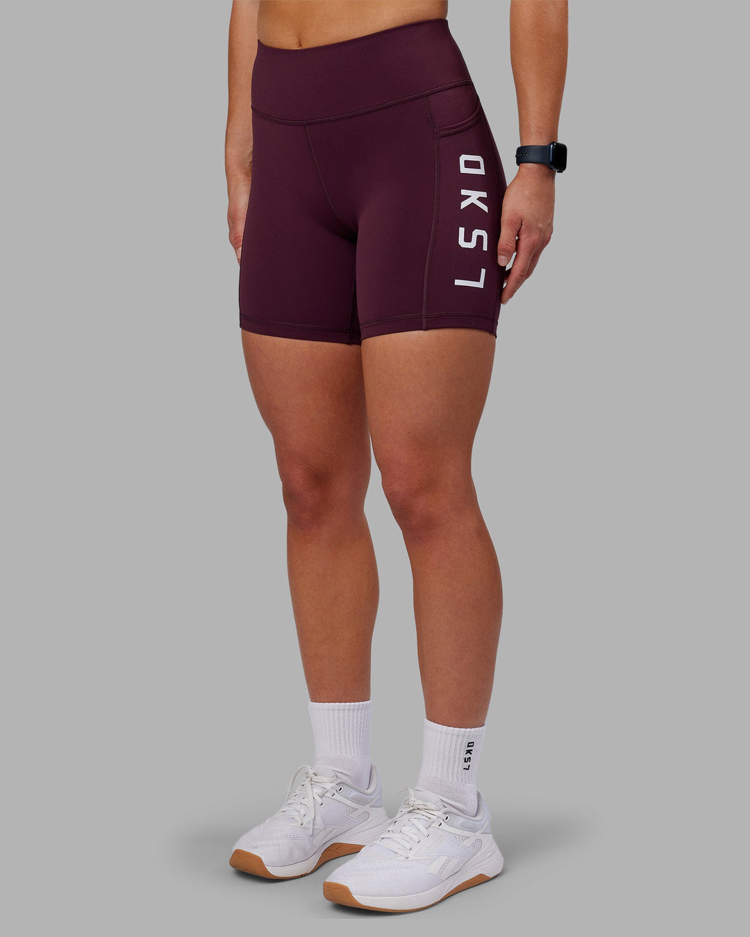 Woman wearing Rep Ultra High-Rise 6&quot; Short Pockets - Cherry Lacquer-White | Model:Keisha | Size:S