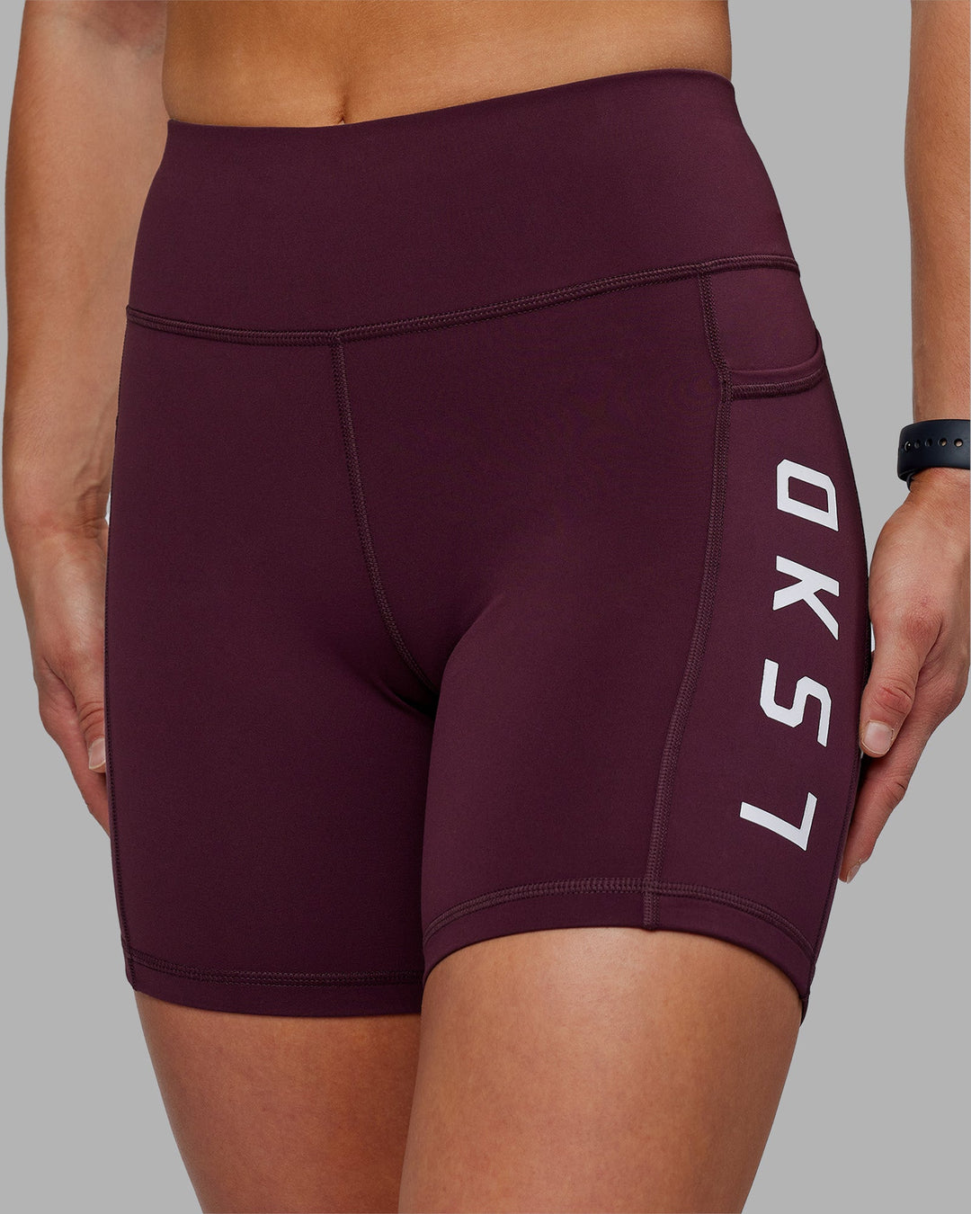 Woman wearing Rep Ultra High-Rise 6&quot; Short Pockets - Cherry Lacquer-White | Model:Keisha | Size:S