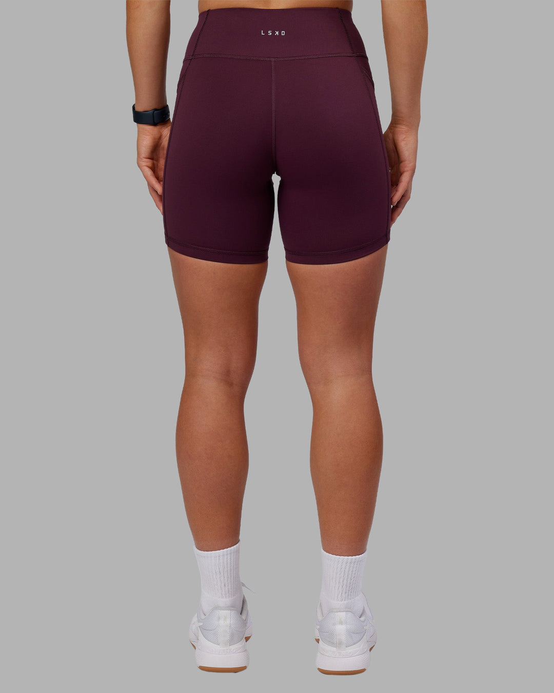 Woman wearing Rep Ultra High-Rise 6&quot; Short Pockets - Cherry Lacquer-White | Model:Keisha | Size:S