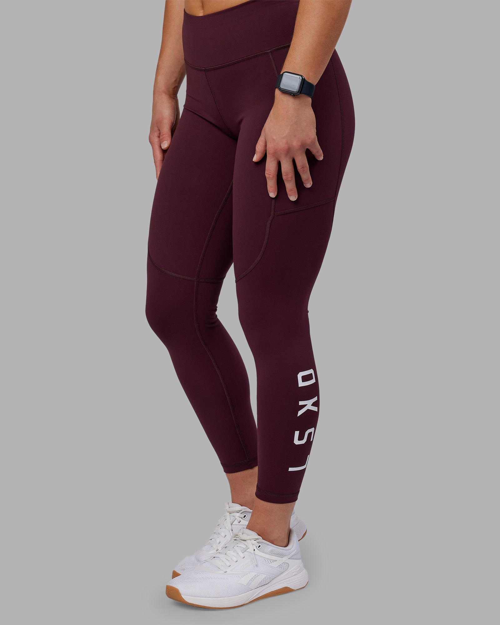 Woman wearing Rep Ultra High-Rise 7/8 Legging Pockets - Cherry Lacquer-White | Model:Keisha | Size:S