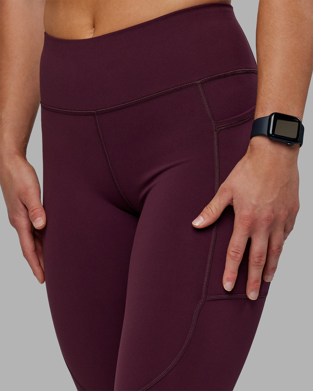 Woman wearing Rep Ultra High-Rise 7/8 Legging Pockets - Cherry Lacquer-White | Model:Keisha | Size:S