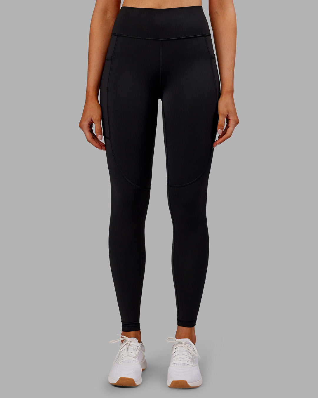 Woman wearing Rep Ultra High-Rise Full Length Legging Pockets - Black-Ultra Orange | Model:Ella | Size:S