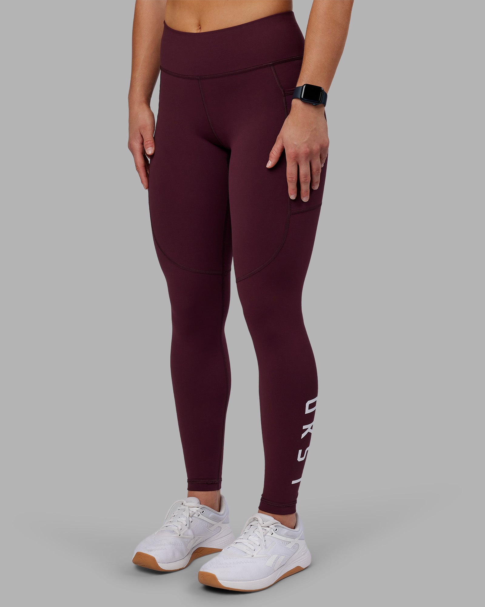 Woman wearing Rep Ultra High-Rise Full Length Legging Pockets - Cherry Lacquer-White | Model:Keisha | Size:S