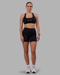 Woman wearing Rep Ultra High-Rise 4" Short Pockets - Black-White