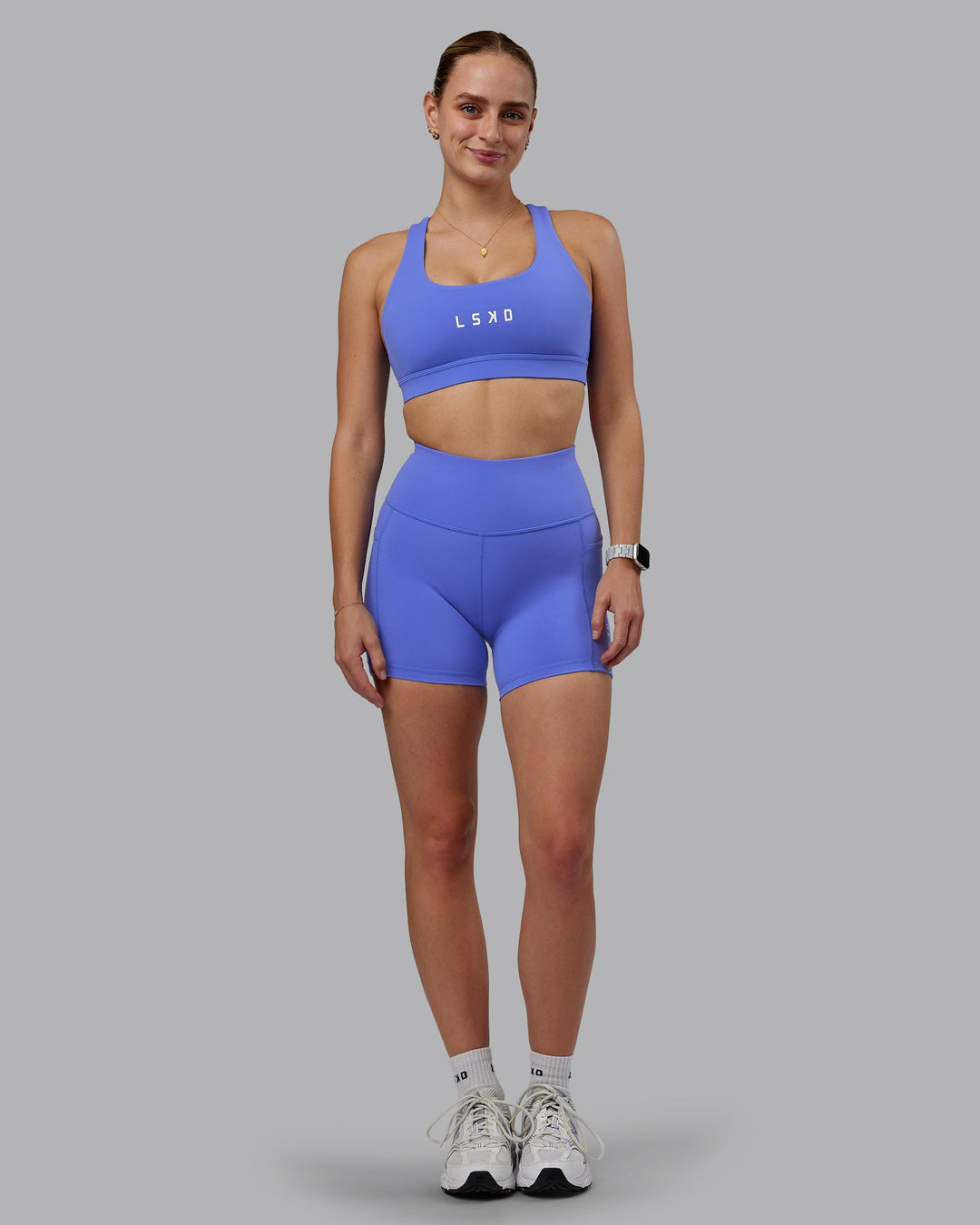 Woman wearing Rep X-Short Tights - Baja Blue-White