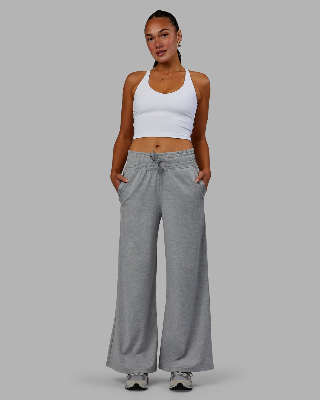 Woman wearing Restore CloudFLX Wide Leg Pants - Light Grey Marl