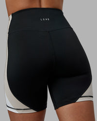 Woman wearing Revitalise Ultra High-Rise 6" Short - Black-Multi | Model:Tylah | Size:S | Thumbnail Index: 7