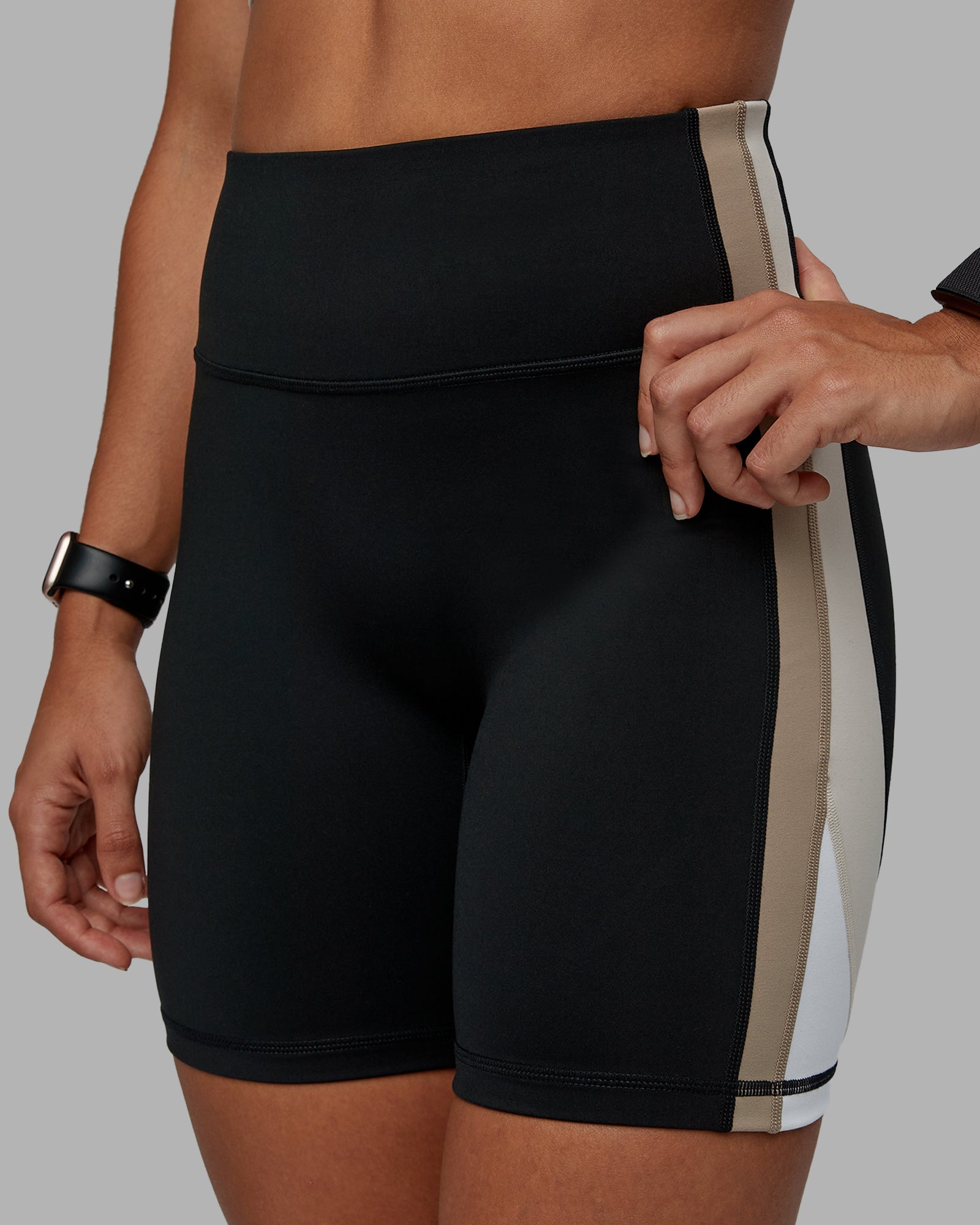 Woman wearing Revitalise Ultra High-Rise 6" Short - Black-Multi | Model:Tylah | Size:S