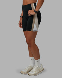 Woman wearing Revitalise Ultra High-Rise 6" Short - Black-Multi | Model:Tylah | Size:S | Thumbnail Index: 2